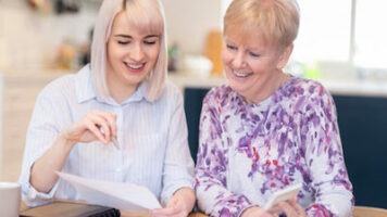 ladies reviewing document
