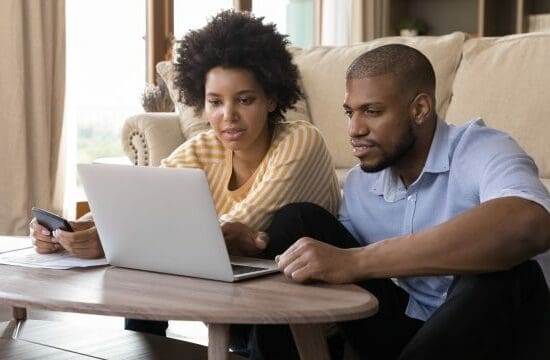 couple looking at laptop