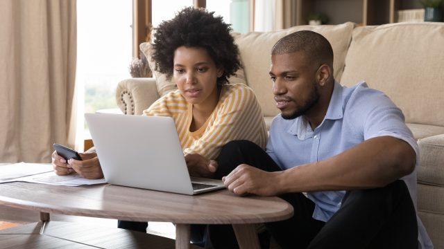 couple looking at laptop