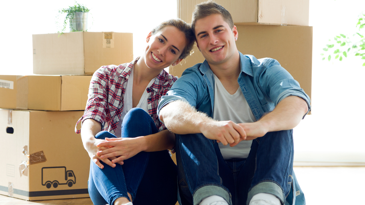 couple in front of boxes