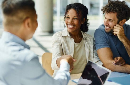 Couple-Shaking-Hands-with-Lender