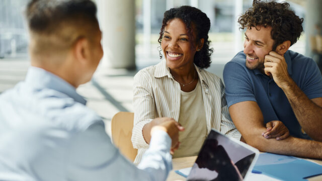 Couple-Shaking-Hands-with-Lender